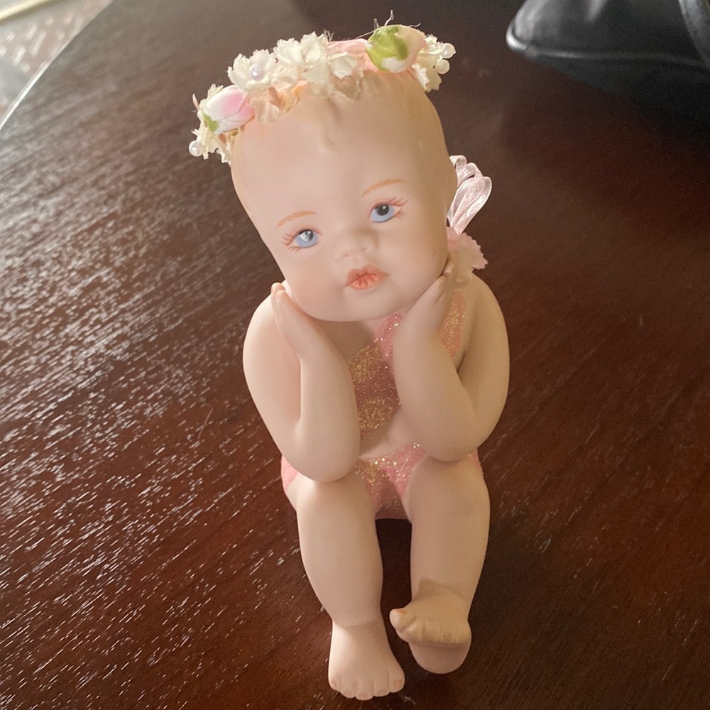 Gorgeous porcelain baby figurine by HC
